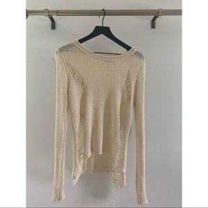 white ripped designed sweater